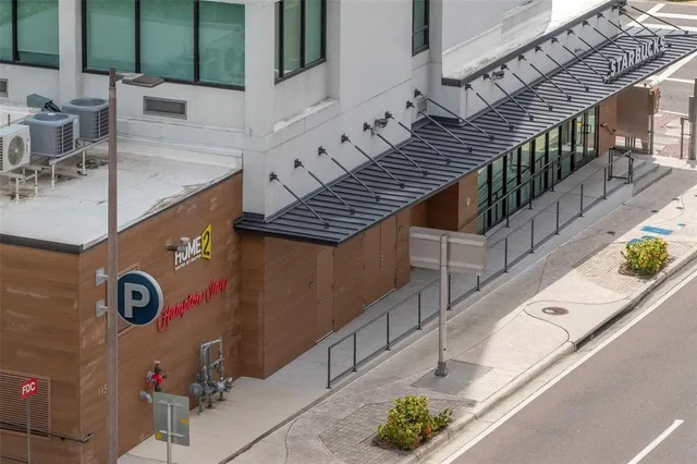 a room with furniture and wooden floor