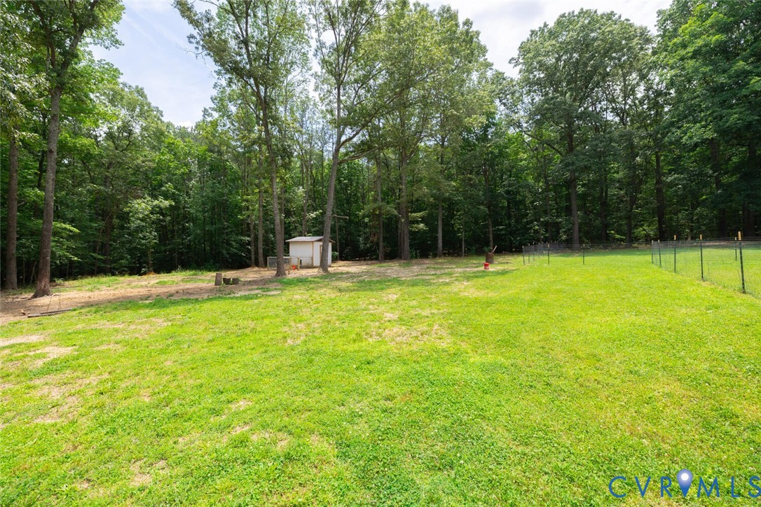 12397 New Market Mill Road Beaverdam, VA 23015 - Photo 40 of 44 a view of outdoor space with swimming pool and patio