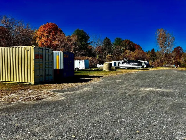 a view of a house with outdoor space and a yard