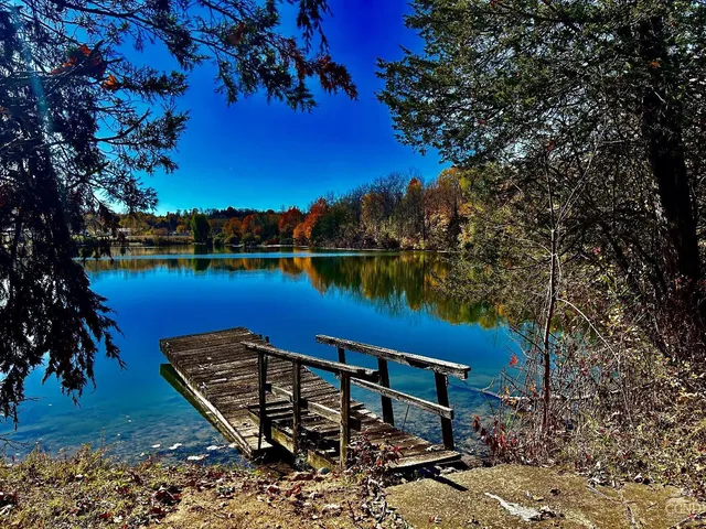 a view of a lake with a outdoor space