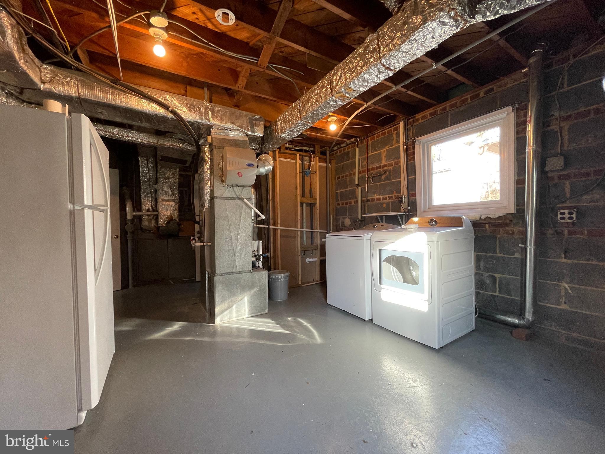 12705 Littleton Street Silver Spring, MD 20906 - Photo 26 of 33 Laundry/utility room with exit to yard
