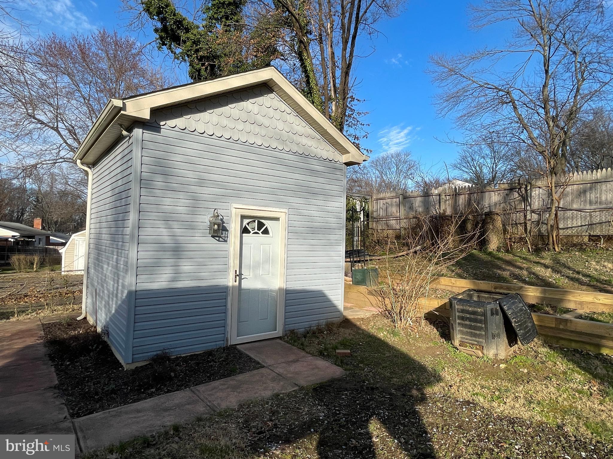 12705 Littleton Street Silver Spring, MD 20906 - Photo 29 of 33 Large shed with electric, workbench, and shelving