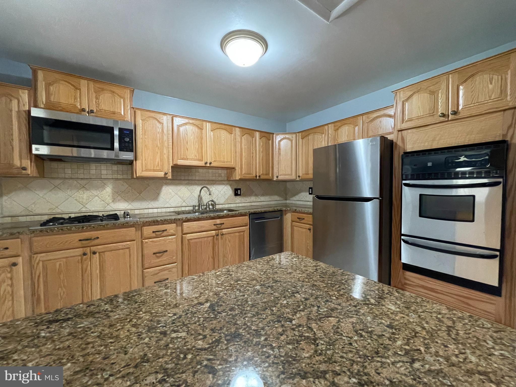 12705 Littleton Street Silver Spring, MD 20906 - Photo 5 of 33 Kitchen with granite