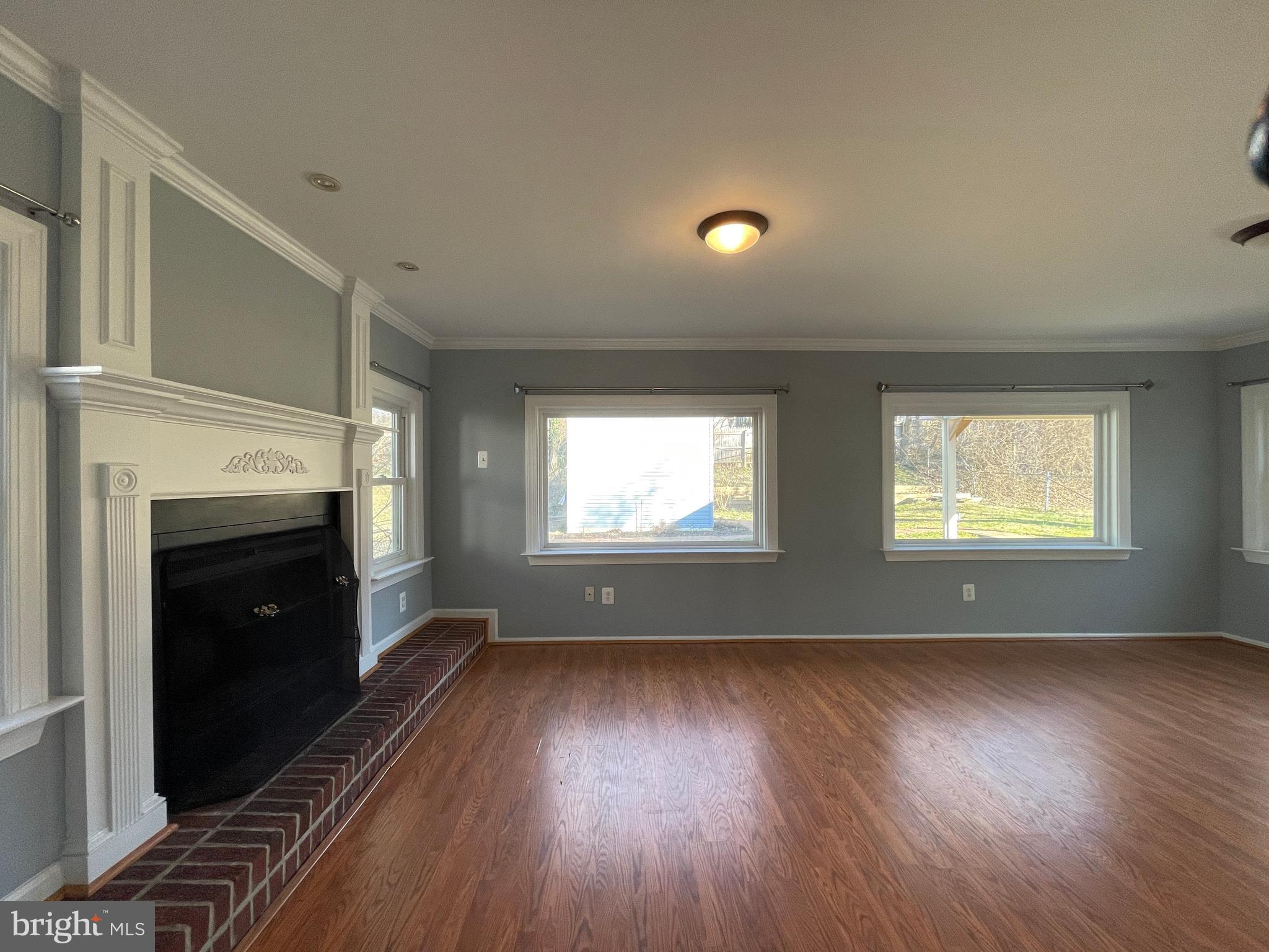 12705 Littleton Street Silver Spring, MD 20906 - Photo 7 of 33 Sunroom addition with fireplace