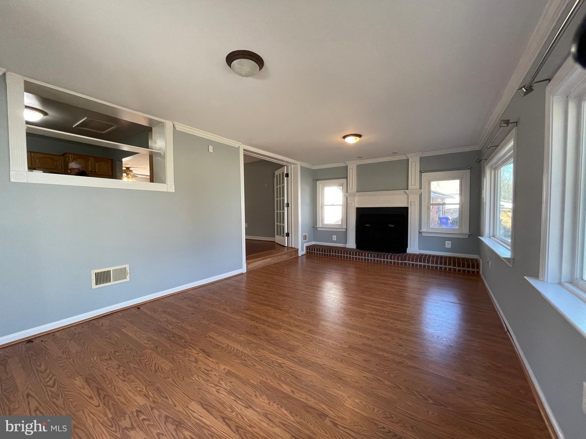 12705 Littleton Street Silver Spring, MD 20906 - Photo 10 of 33 Sunroom addition open to kitchen and dining room