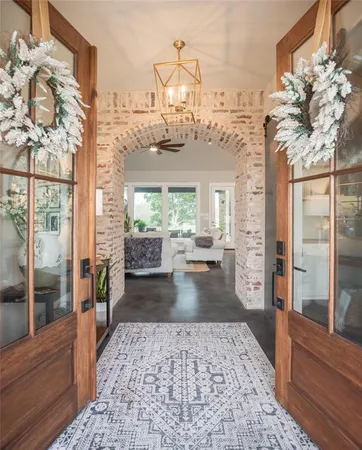 a very nice looking living room with a large window