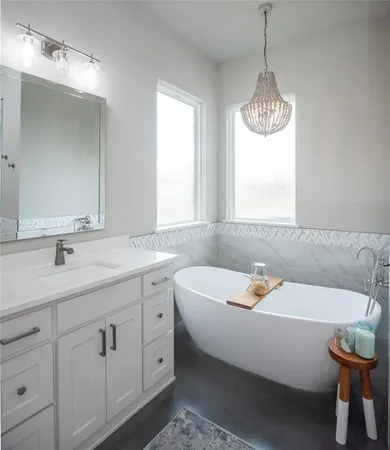 a bathroom with a sink and a bathtub