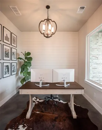 a view of a workspace with furniture