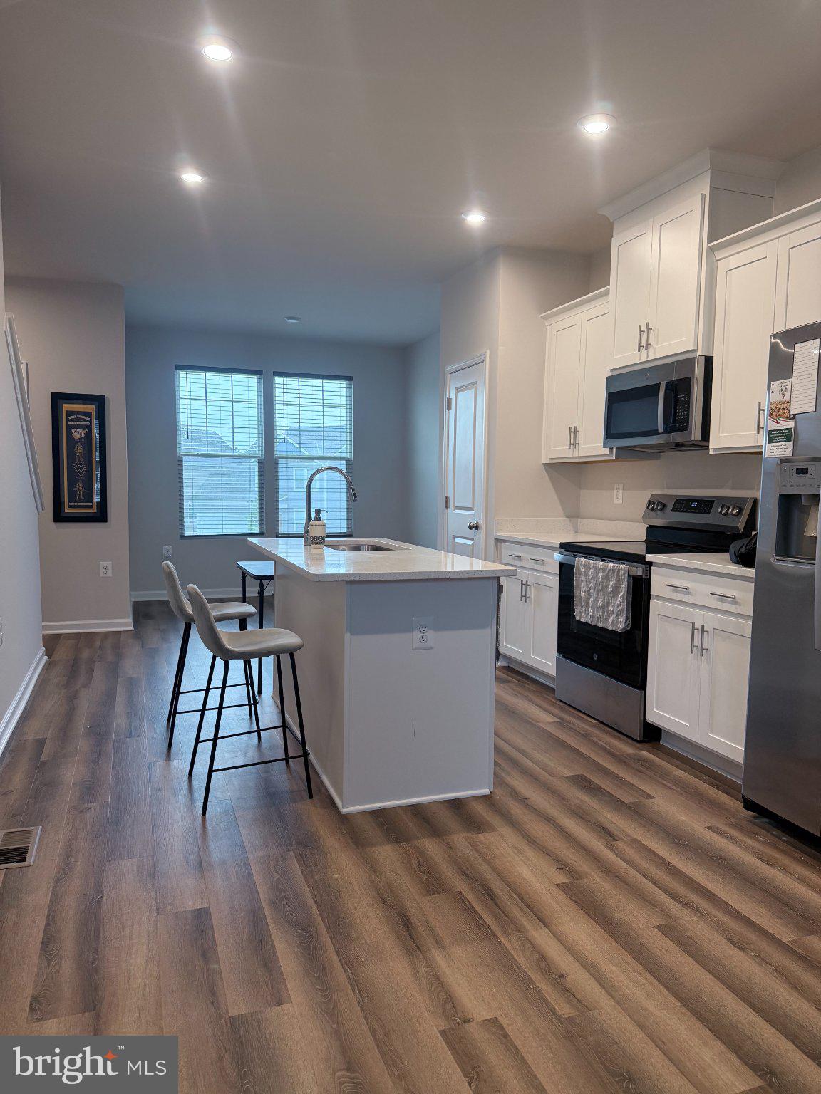 238 Coolidge Avenue Ranson, WV 25438 - Photo 16 of 17 Modern kitchen with sleek finishes.