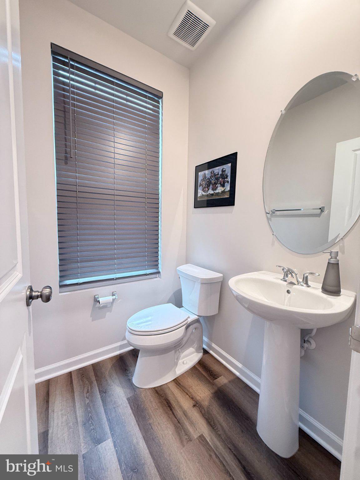 238 Coolidge Avenue Ranson, WV 25438 - Photo 6 of 17 Sleek and modern half-bath.