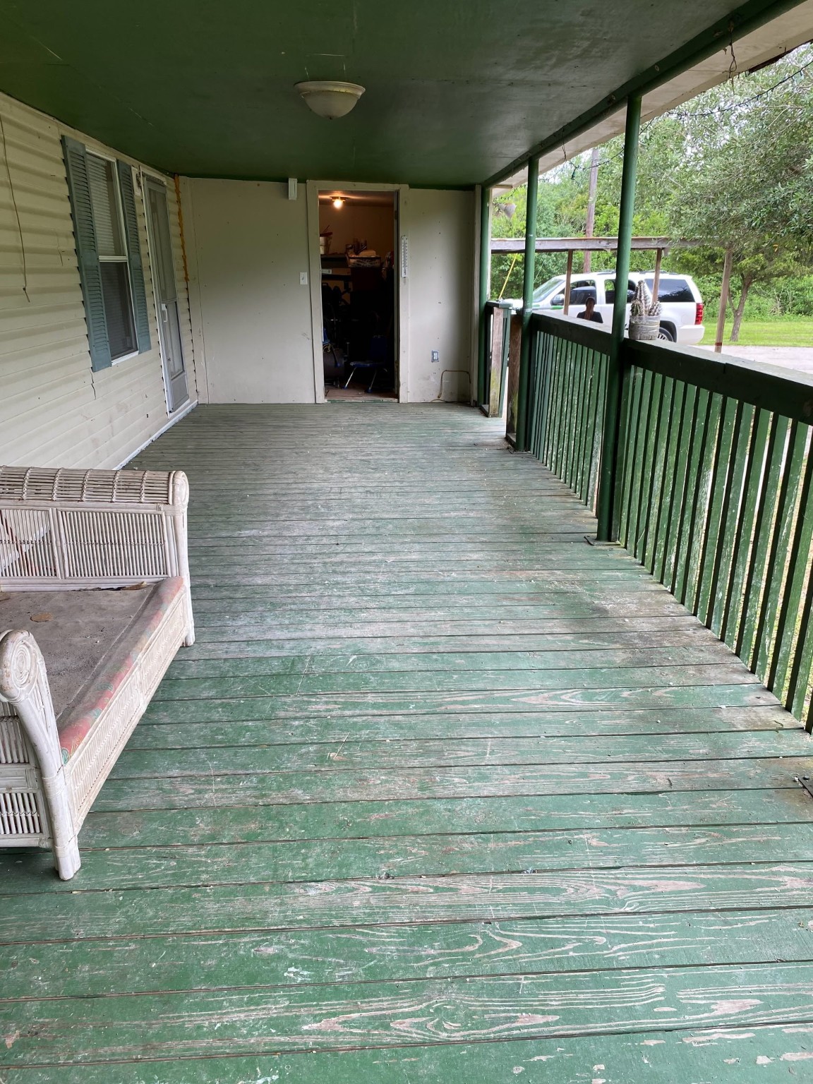 2130 Hayes Road Winnie, TX 77665 - Photo 4 of 13 a view of a living room and a floor to ceiling window