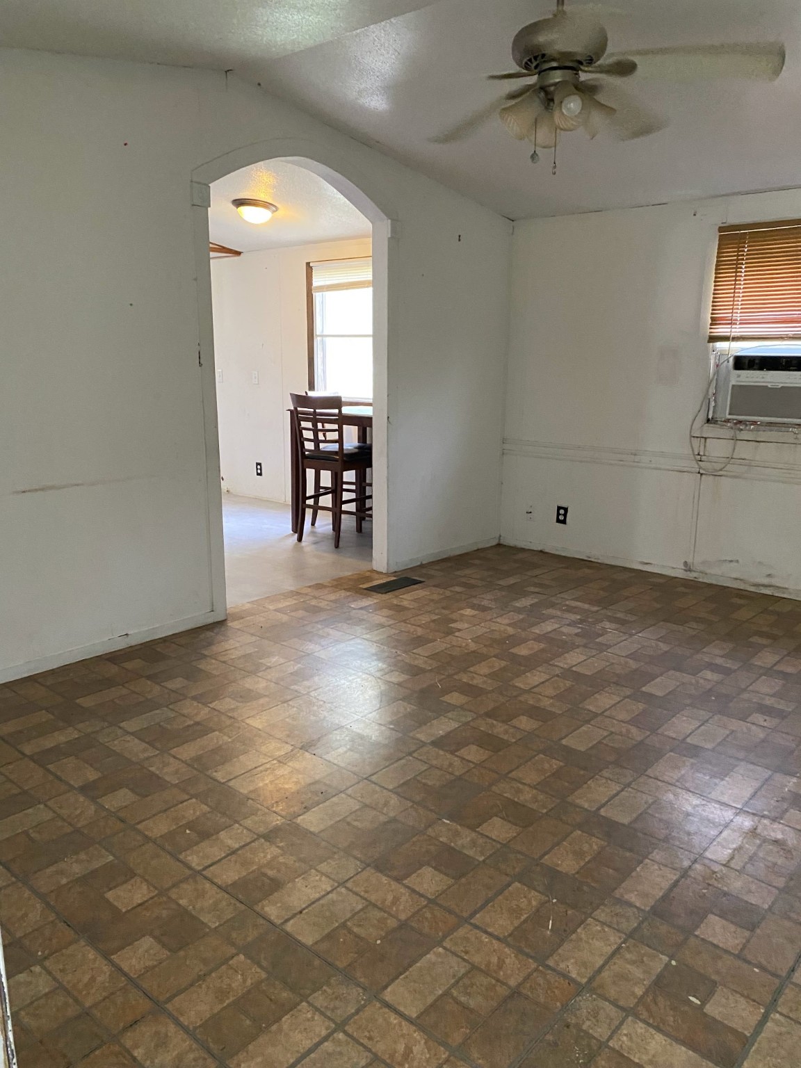 2130 Hayes Road Winnie, TX 77665 - Photo 8 of 13 an empty room with windows