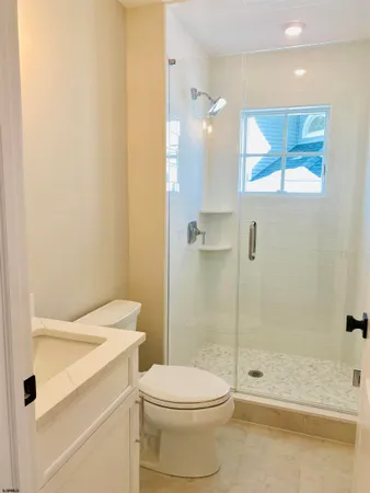 a room with a bed and a window