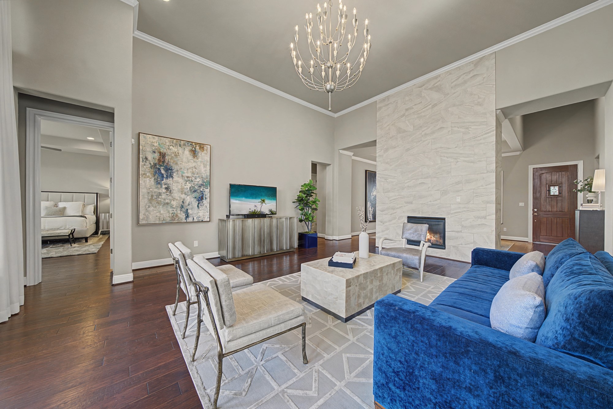 16024 La Rosa Drive Bee Cave, TX 78738 - Photo 11 of 39 The crown molding and luxury chandelier add a pop of wow here!