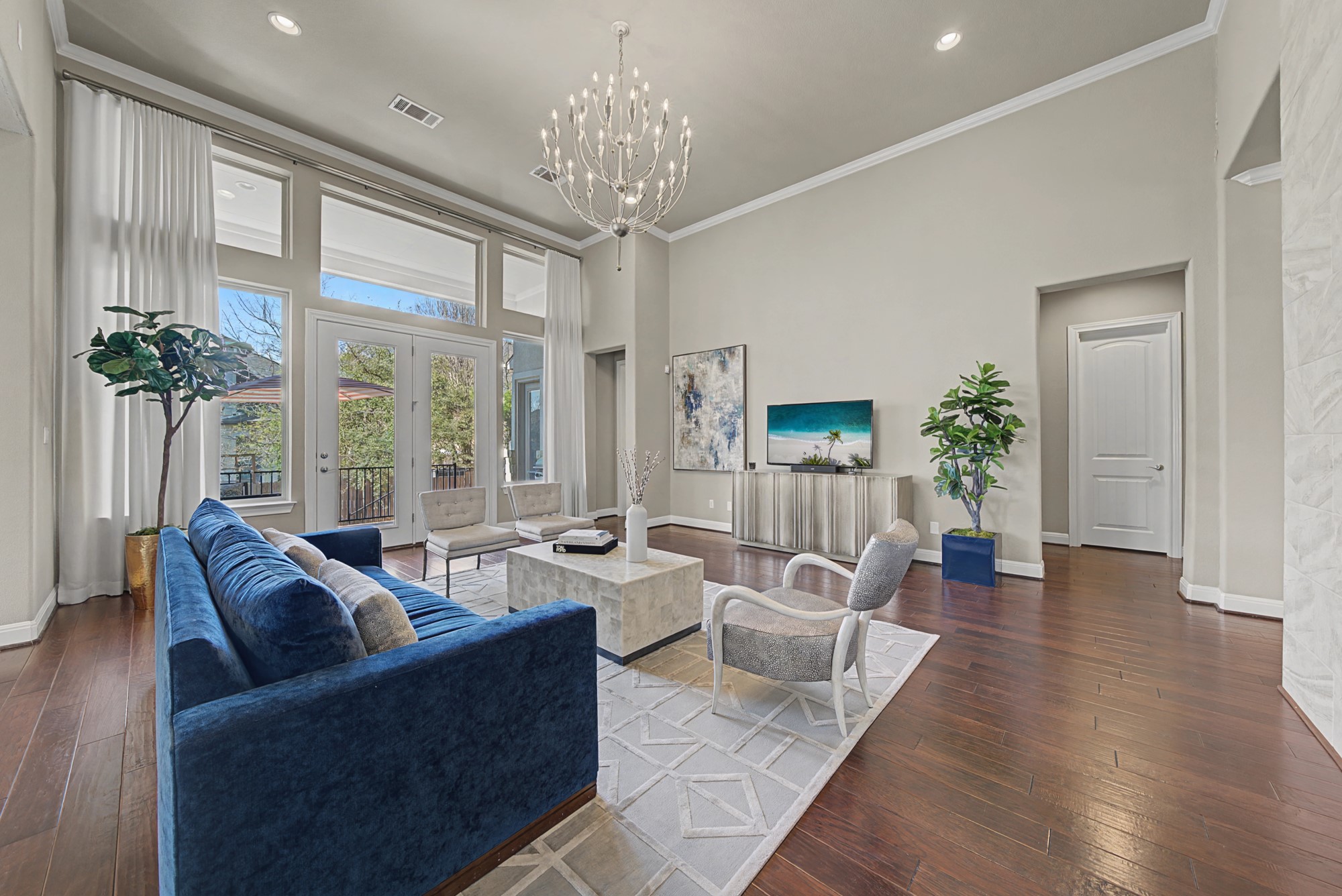 16024 La Rosa Drive Bee Cave, TX 78738 - Photo 12 of 39 The primary suite is located to the right of the windows.