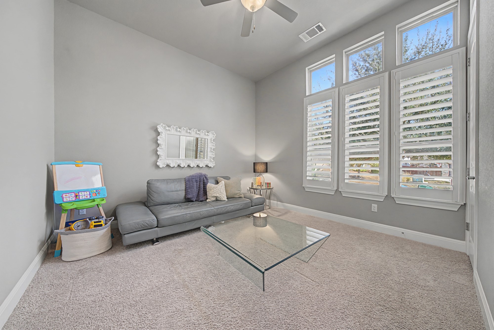 16024 La Rosa Drive Bee Cave, TX 78738 - Photo 27 of 39 Guest bed #1 with ceiling fan and walk-in closet