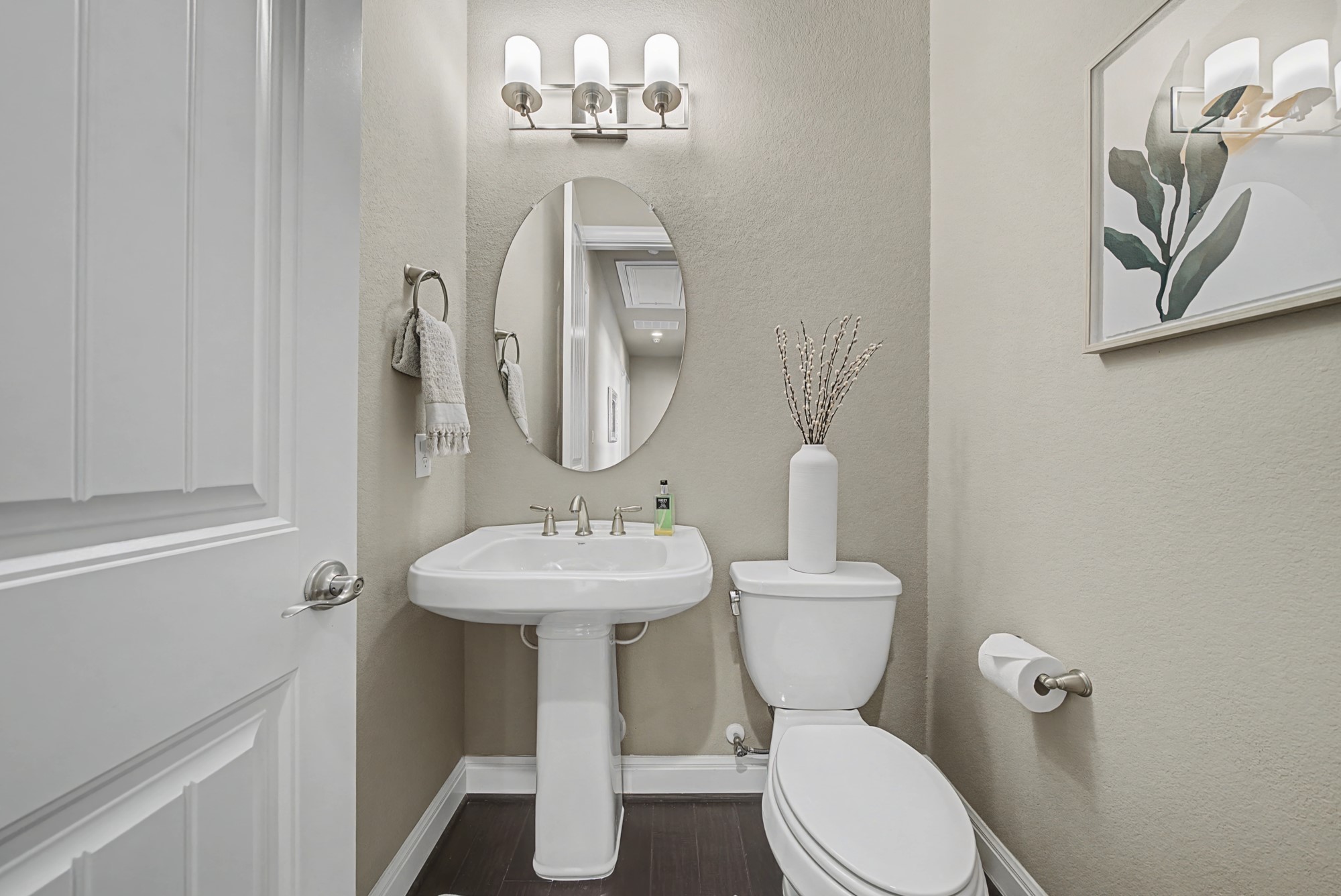 16024 La Rosa Drive Bee Cave, TX 78738 - Photo 32 of 39 Half bath located near the dining room.