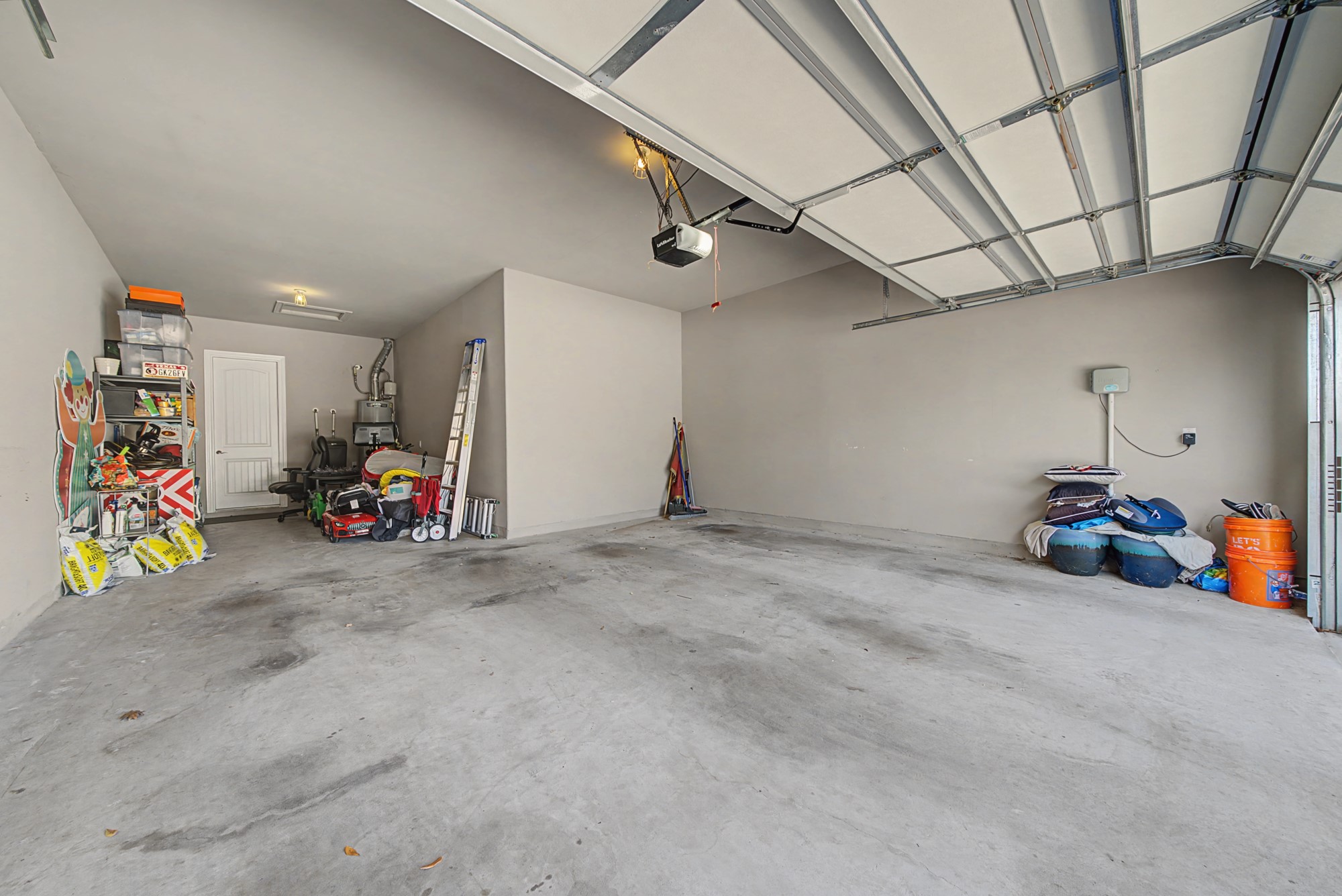 16024 La Rosa Drive Bee Cave, TX 78738 - Photo 34 of 39 3 car tandem garage - so much storage here!