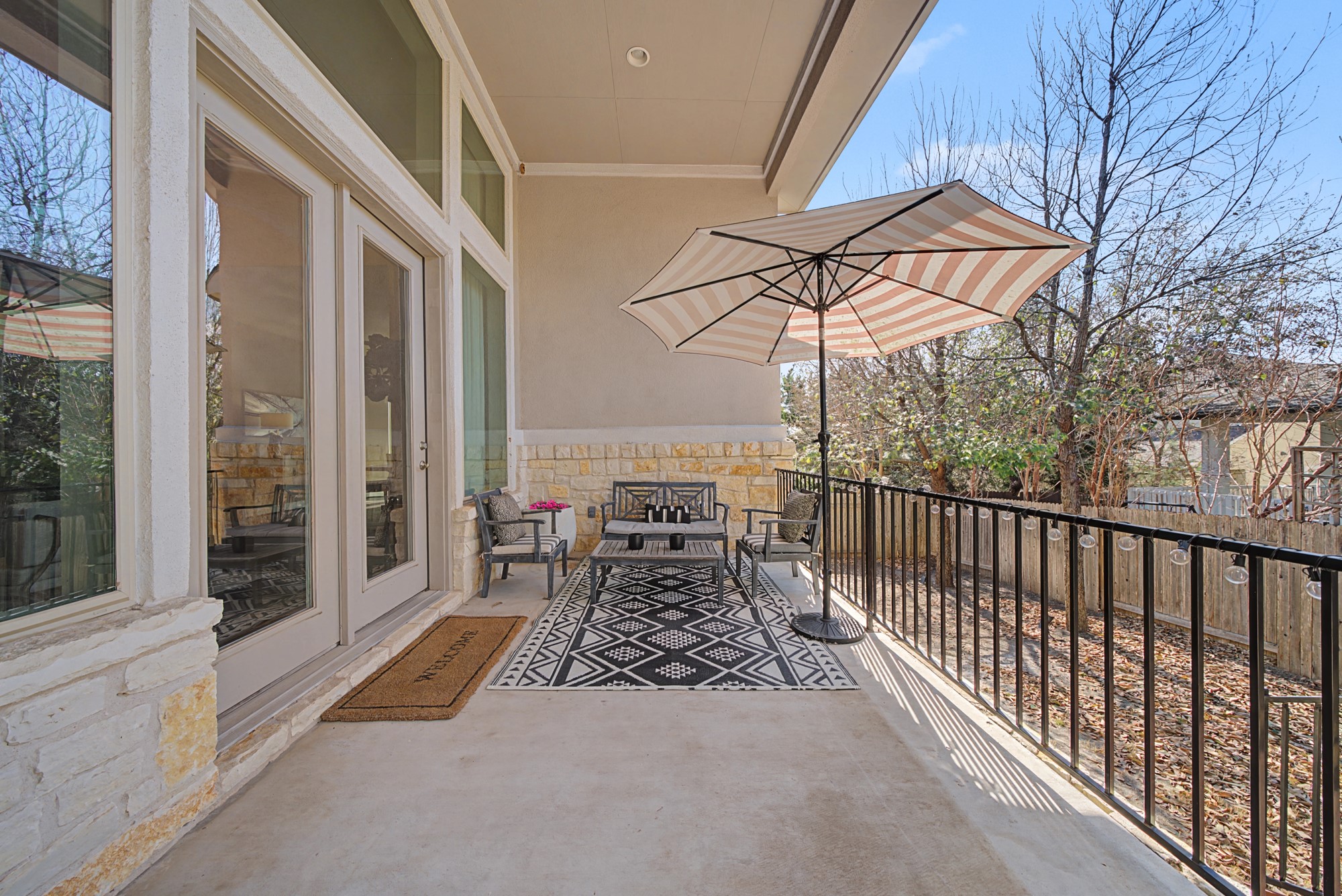 16024 La Rosa Drive Bee Cave, TX 78738 - Photo 35 of 39 Enjoy this covered rear patio overlooking the backyard.