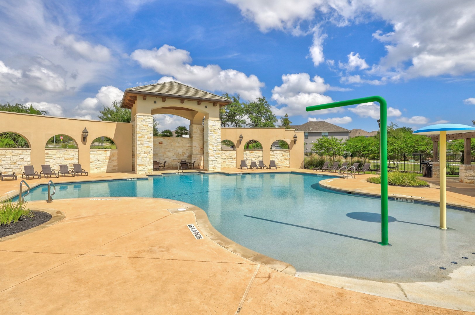 16024 La Rosa Drive Bee Cave, TX 78738 - Photo 39 of 39 Large community pool with splash pad, beach entry & restrooms on site