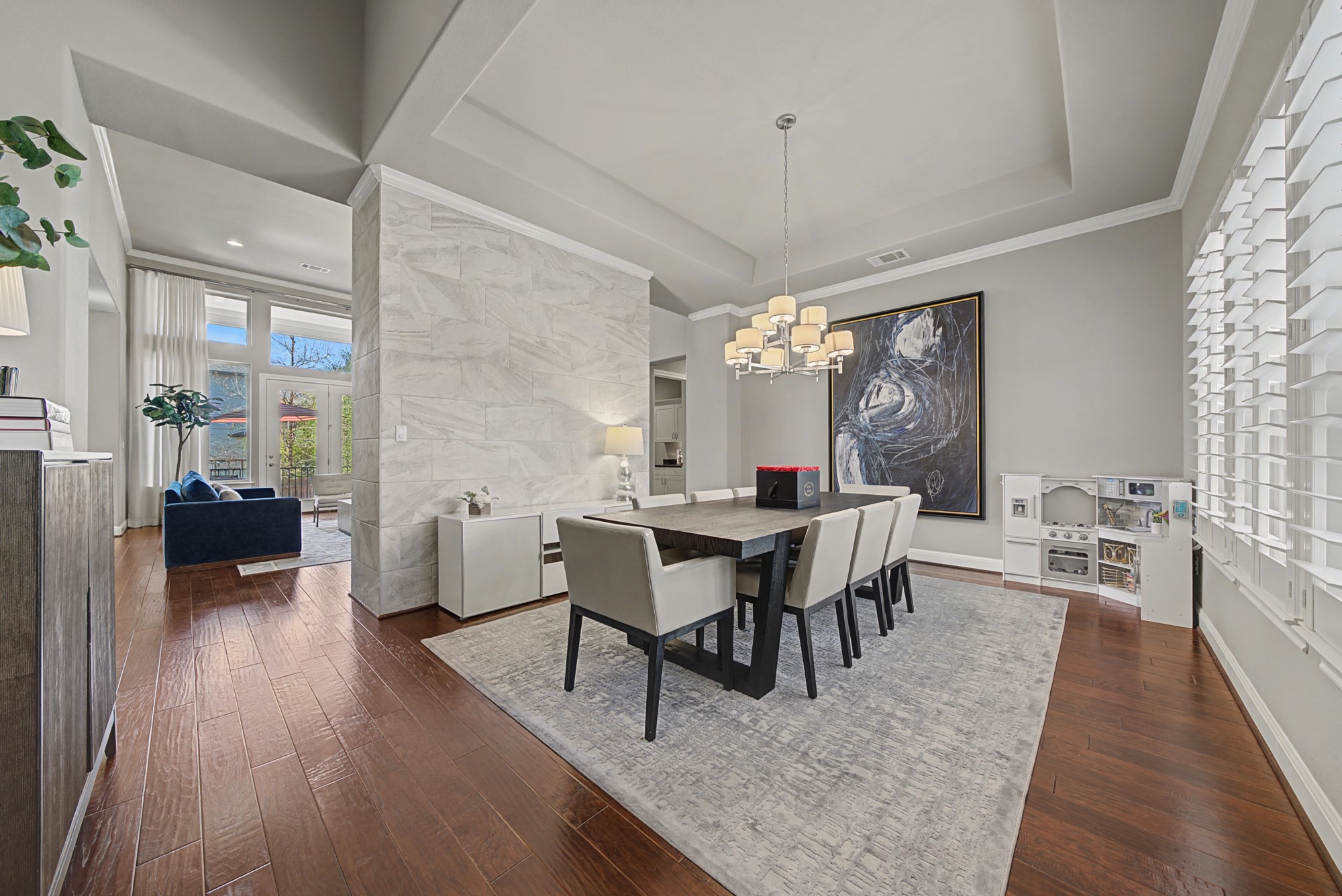 16024 La Rosa Drive Bee Cave, TX 78738 - Photo 8 of 39 Also of note is the statement tile wrapped wall separating the space.