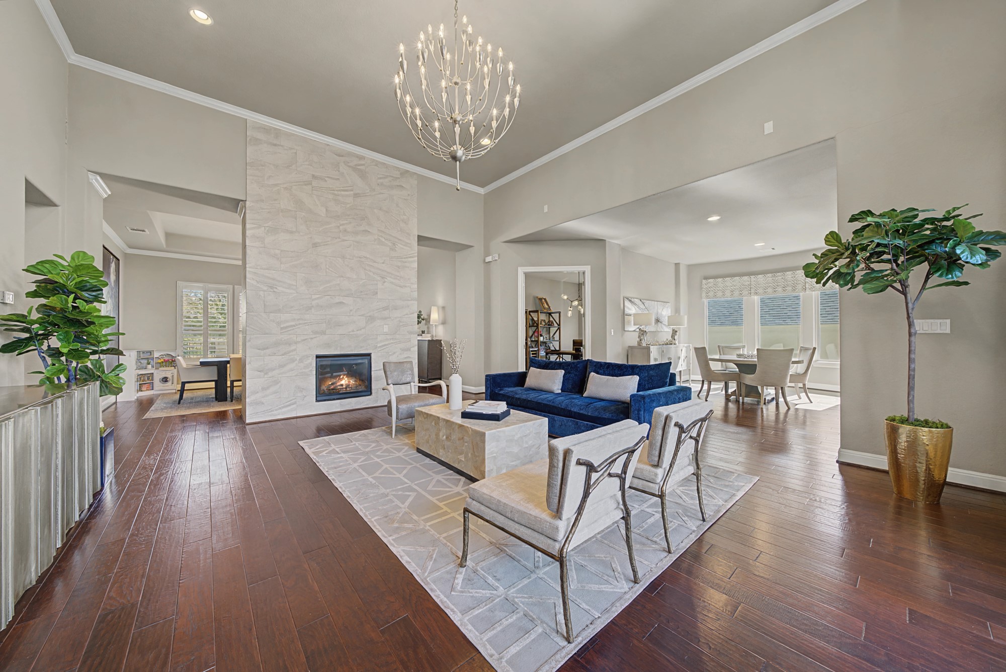 16024 La Rosa Drive Bee Cave, TX 78738 - Photo 9 of 39 This luxurious living area boasts the floor to ceiling tiled fireplace.
