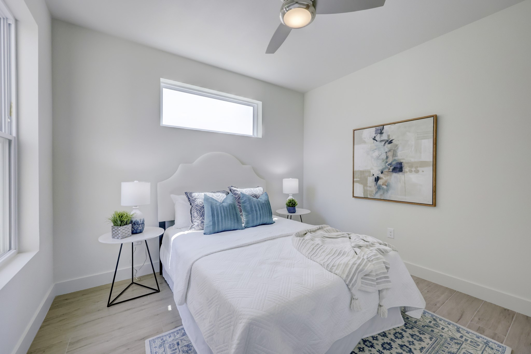 4300 Mansfield Dam Road, Unit 1221 Austin, TX 78734 - Photo 11 of 38 a bedroom with a bed and a painting on the wall