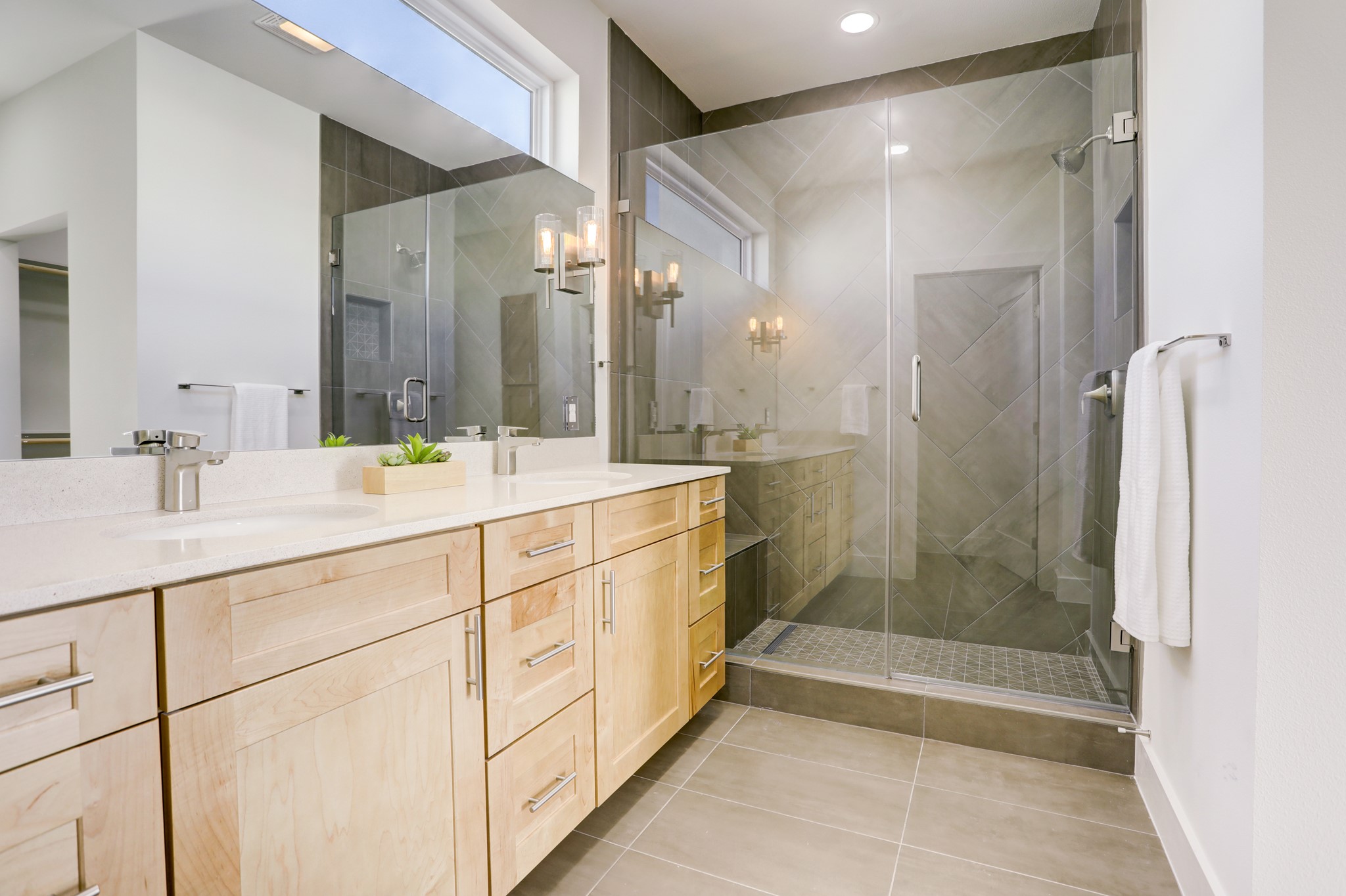 4300 Mansfield Dam Road, Unit 1221 Austin, TX 78734 - Photo 21 of 38 a bathroom with a shower sink and mirror