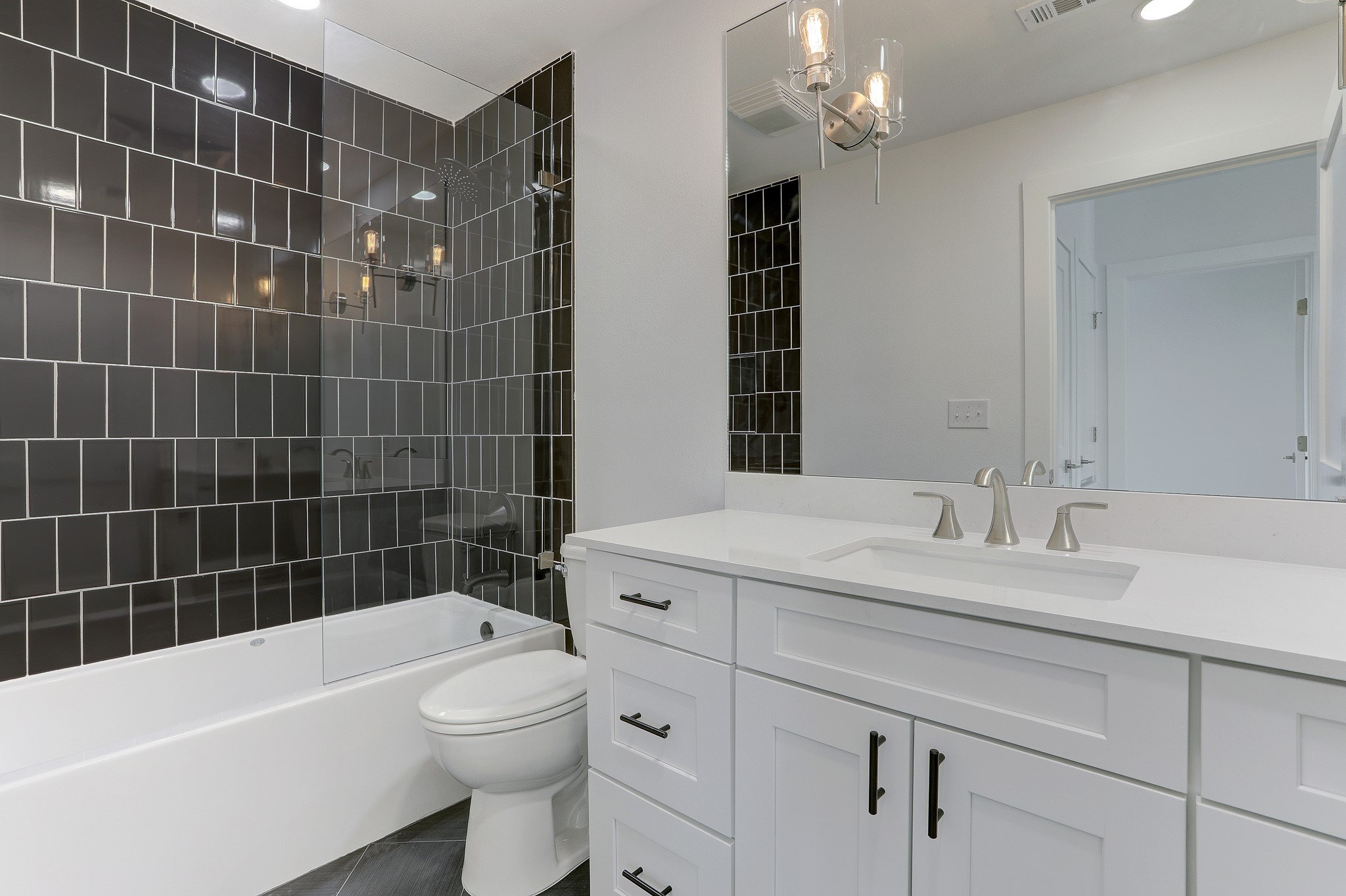 4300 Mansfield Dam Road, Unit 1221 Austin, TX 78734 - Photo 23 of 38 a bathroom with a sink a toilet and bathtub