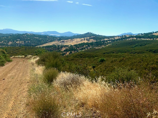 10455 Sky High Ridge Road Lower Lake, CA 95457 - Photo 2 of 17 a view of lake with mountain