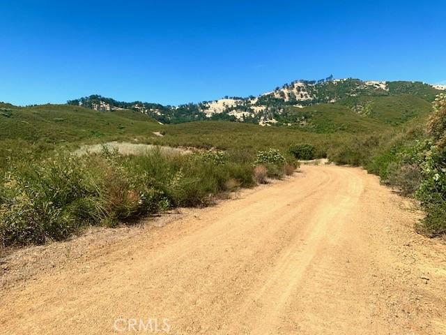 10455 Sky High Ridge Road Lower Lake, CA 95457 - Photo 3 of 17 a view of lake with mountain