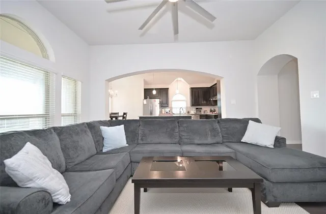 a view of a dining room with furniture and window