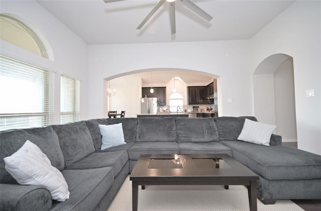 1802 Ranch View Drive Cedar Hill, TX 75104 - Photo 14 of 40 a living room with a couch and a large window