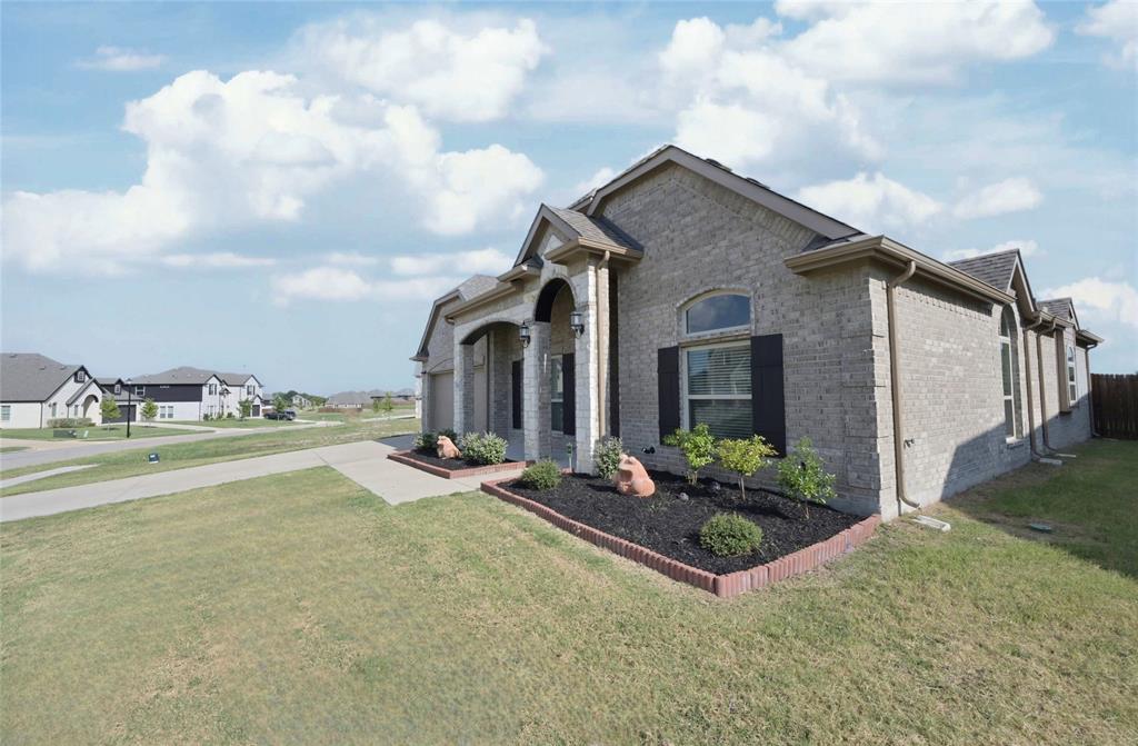 1802 Ranch View Drive Cedar Hill, TX 75104 - Photo 38 of 40 a view of a house with backyard and garden