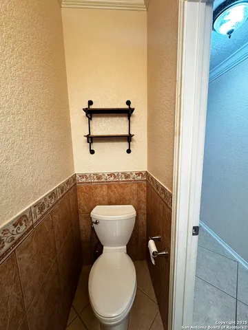 a kitchen with stainless steel appliances a stove and a refrigerator