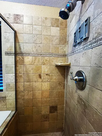 a view of a bathroom with a tub