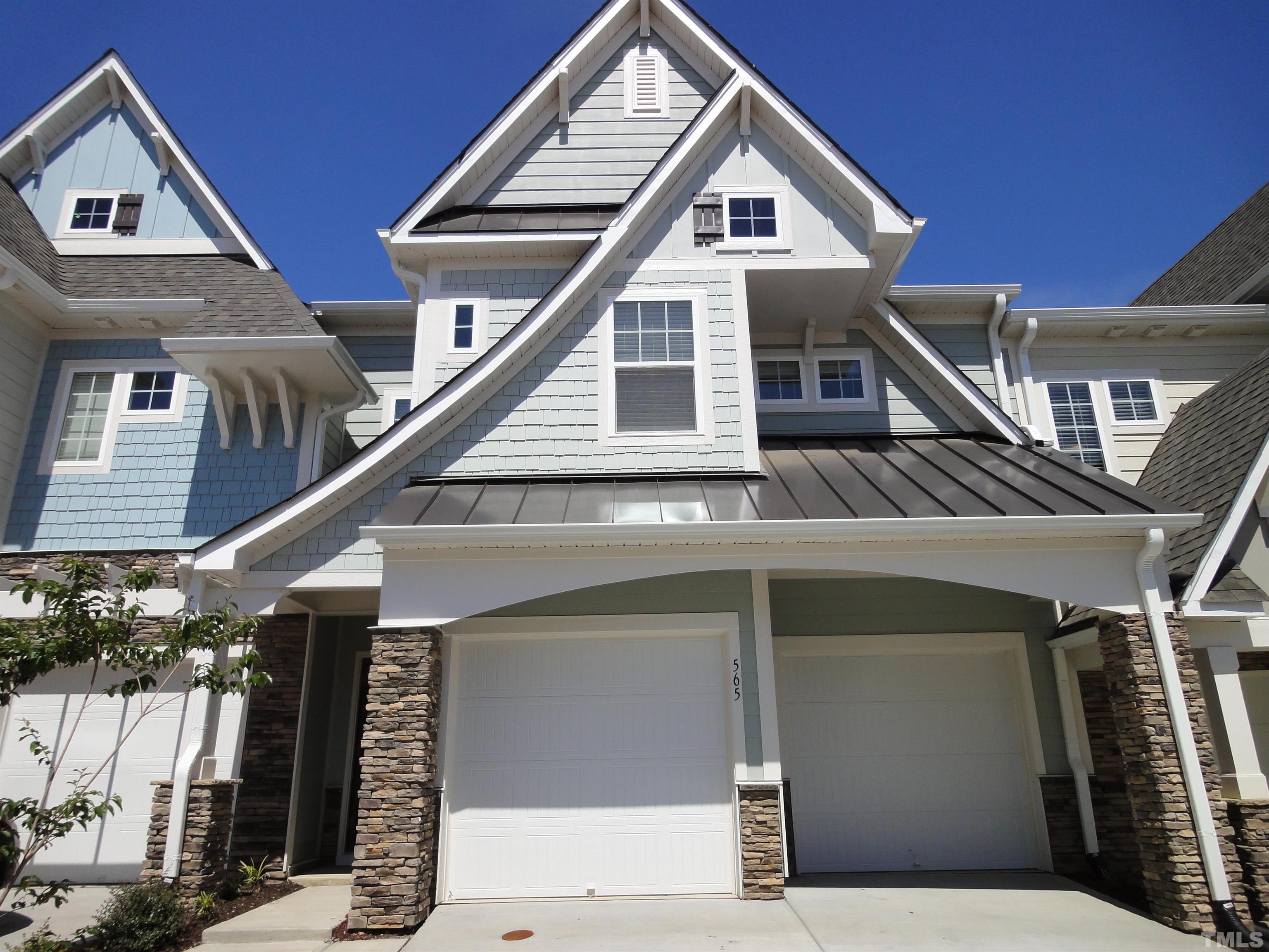 565 Metro Station Apex, NC 27502 - Photo 1 of 29 a view of a house with wooden stairs