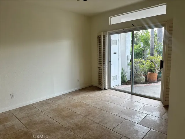 a kitchen with a sink and a refrigerator