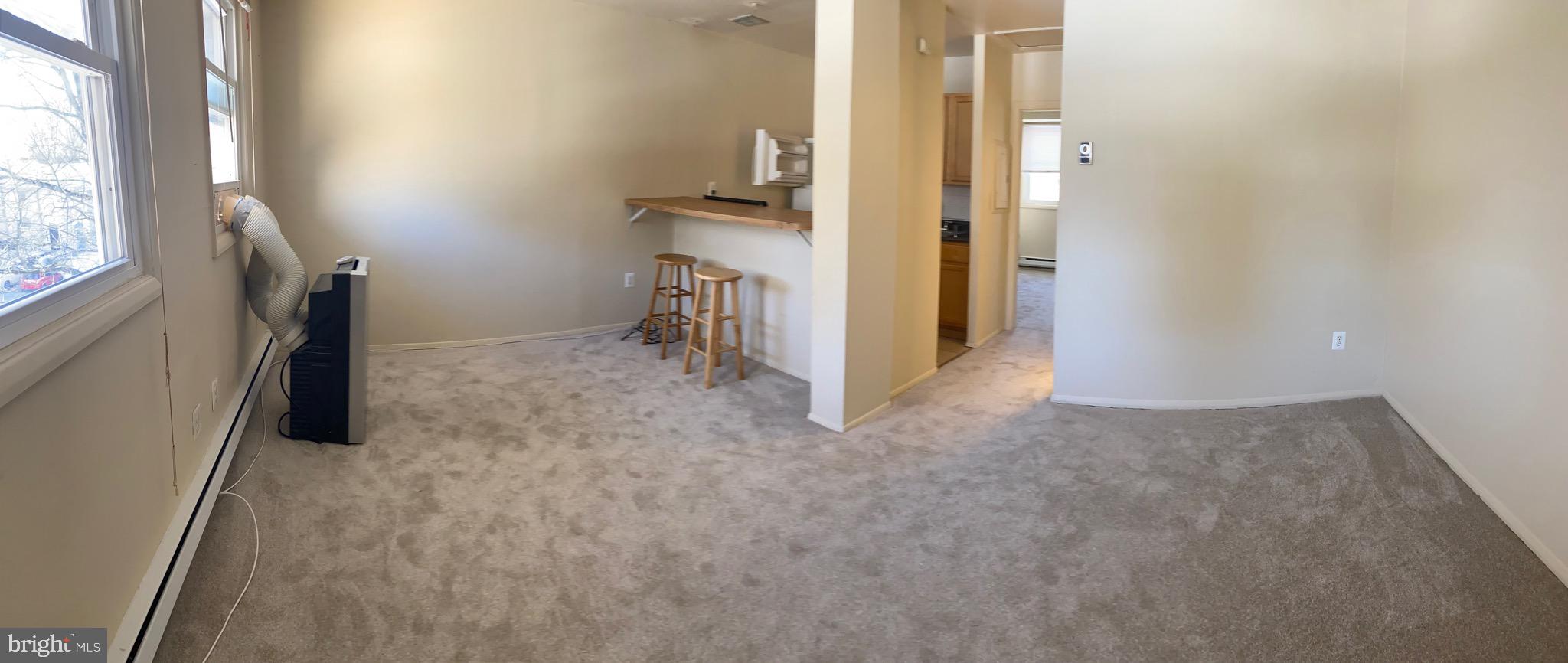9323 Matador Road, Unit A Columbia, MD 21045 - Photo 2 of 9 a view of a storage & utility room