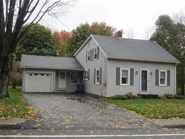 2115 Calkins Road Palmer, MA 01069 - Photo 1 of 22 front view of a house with a yard