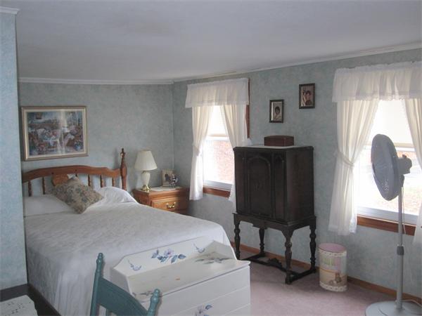 2115 Calkins Road Palmer, MA 01069 - Photo 11 of 22 a bedroom with a bed and a window