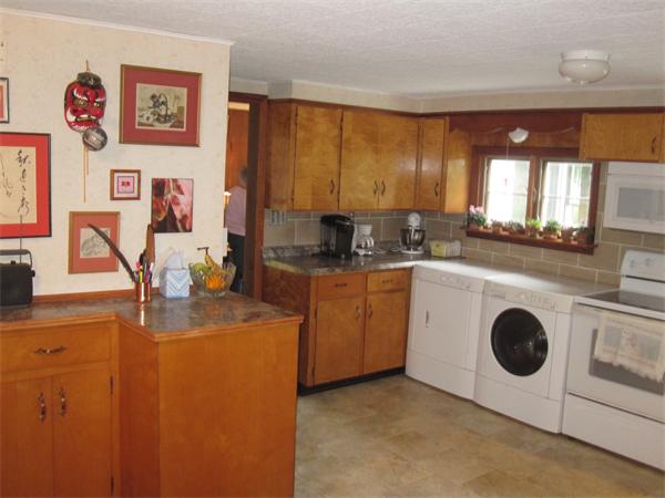 2115 Calkins Road Palmer, MA 01069 - Photo 17 of 22 a kitchen with cabinets a sink and appliances