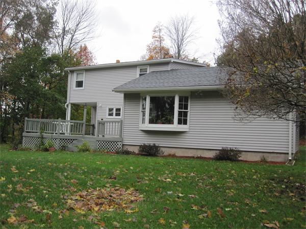 2115 Calkins Road Palmer, MA 01069 - Photo 19 of 22 a front view of house with yard