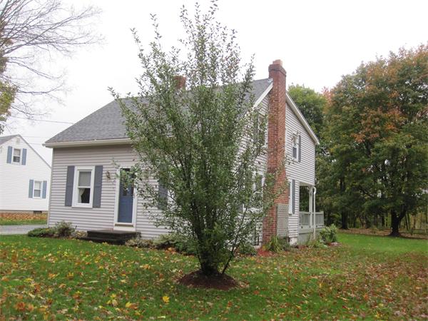 2115 Calkins Road Palmer, MA 01069 - Photo 21 of 22 a view of a house with a yard