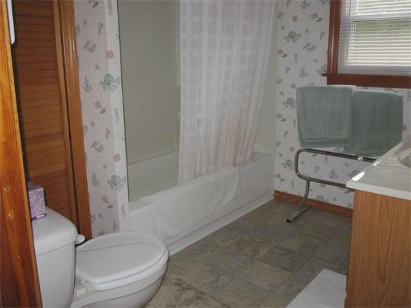 2115 Calkins Road Palmer, MA 01069 - Photo 5 of 22 a bathroom with a toilet and a shower