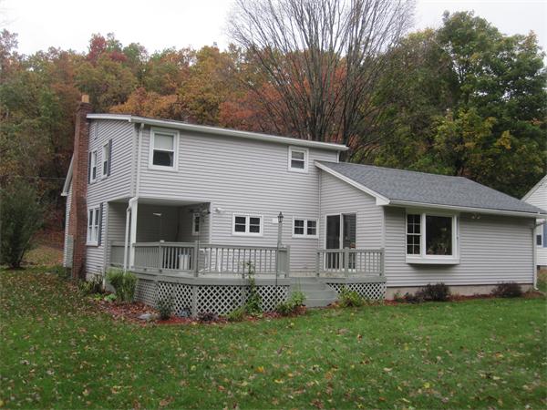 2115 Calkins Road Palmer, MA 01069 - Photo 7 of 22 a view of a house with a yard