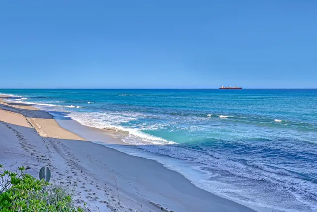 a view of parking area and car parked