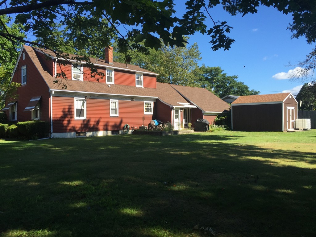 79 Haller Street Springfield, MA 01151 - Photo 11 of 26 a front view of house with yard and green space