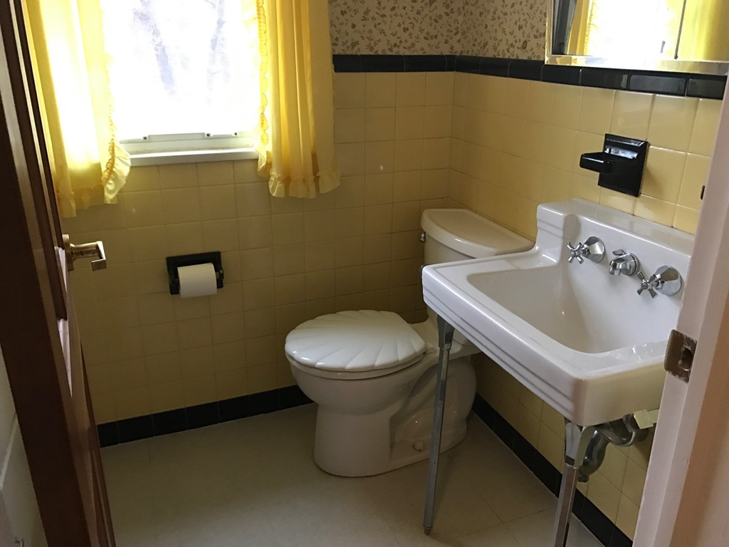 79 Haller Street Springfield, MA 01151 - Photo 21 of 26 a bathroom with a sink and a toilet