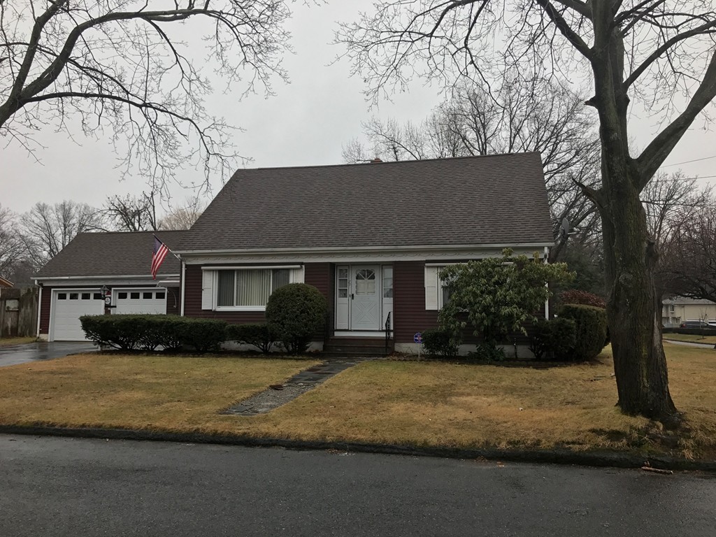 79 Haller Street Springfield, MA 01151 - Photo 25 of 26 a front view of a house with a yard